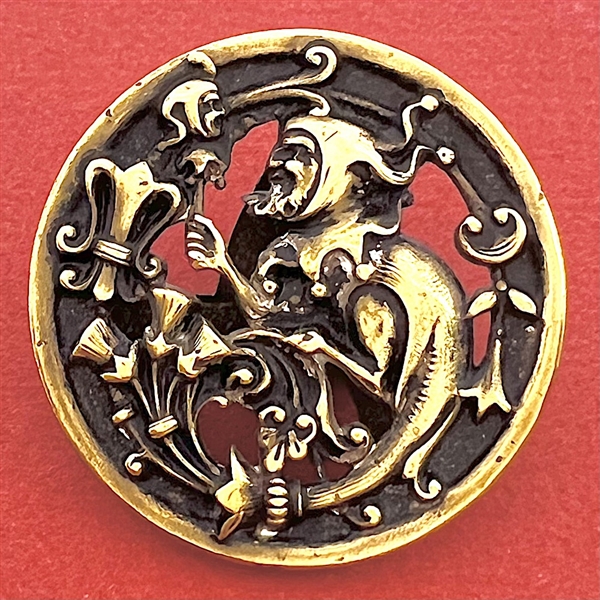 “Jester with Fools Baton" Brass Paris back button.