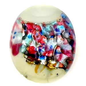 Oval glass button by Leo Popper.