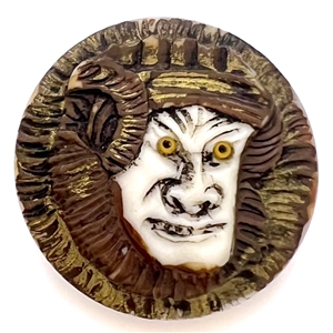 Carved natural material button of an Asian warrior.
