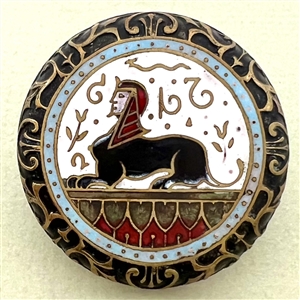 Large enamel button of Egyptian sphinx.