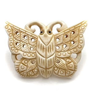 Carved natural material button of a realistic butterfly.