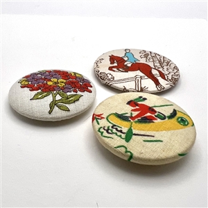 Three 1940's fabric studio buttons by Henrietta Harding from Maine.