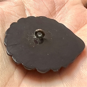 Vintage laminated Bakelite realistic shell button.