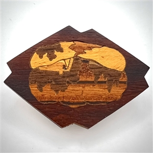 Marquetry wood button of a cabin or a smoking volcano.