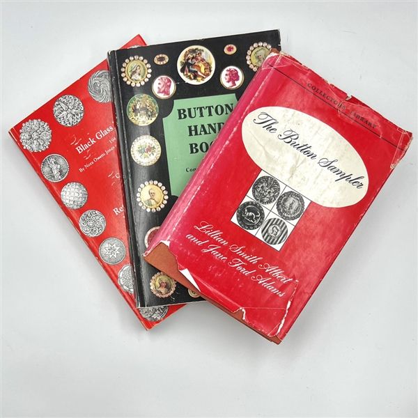 Three button books - “The Button Sampler" “Button Handbook" and “Black Glass Buttons."