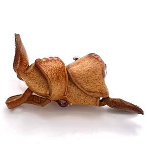 Leather button of a rabbit.