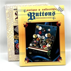 Two button books - “Antique and Collectible Buttons - Identification and Values" Volume one and two. 