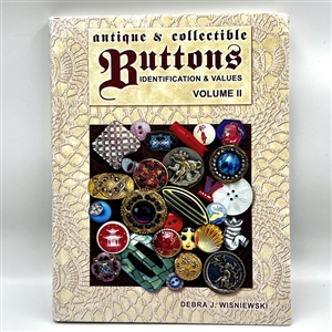 Two button books - “Antique and Collectible Buttons - Identification and Values Volume one and two. 