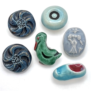 Six French ceramic buttons including Bonfil.