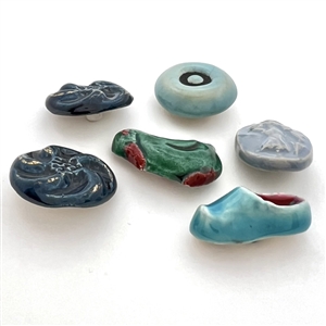 Six French ceramic buttons including Bonfil.