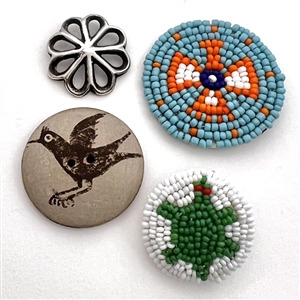 Four Native American buttons. 