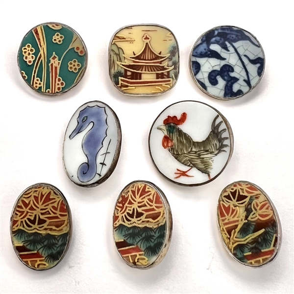 Eight Chinese shard ceramic buttons.