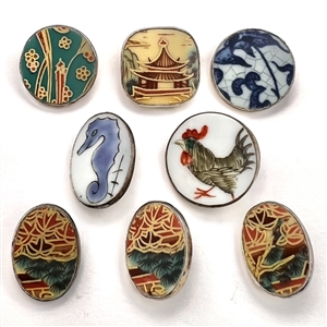 Eight Chinese shard ceramic buttons.