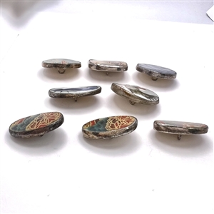 Eight Chinese shard ceramic buttons.
