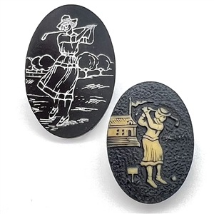 Two celluloid buttons of women golfing. 