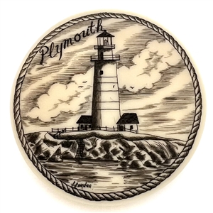 Scrimshaw on plastic of the lighthouse at Plymouth by L. Layden.