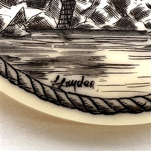 Scrimshaw on plastic of the lighthouse at Plymouth by L. Layden.