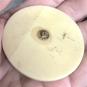 Scrimshaw on plastic of the lighthouse at Plymouth by L. Layden.