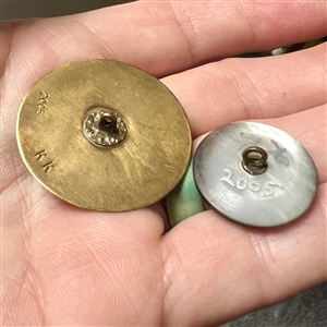 Two cold enamel studio buttons by Kevin Kinne.