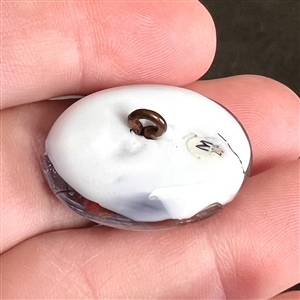 Male and female cardinals - glass studio button by Mary Gaumond.