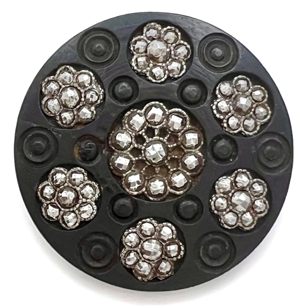 Div I - engine turned dogwood button with faceted steel rosettes.