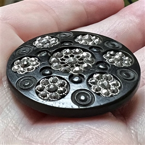 Div I - engine turned dogwood button with faceted steel rosettes.
