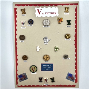 Card of eighteen V for Victory buttons. 