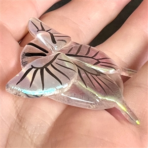 Kay Ferguson fused glass studio button of a butterfly.