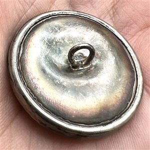 Beautiful open work with pastes over green glass set in metal.