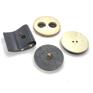 Four Vintage casein buttons in black and off white.