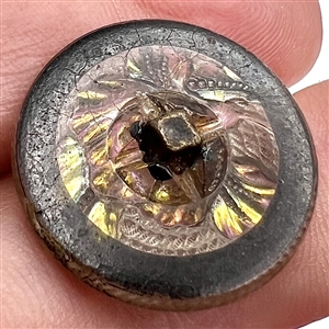 Two glass buttons of flowers.