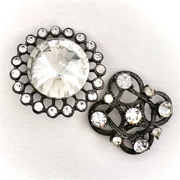 Talk about BLING! Two jeweled buttons.