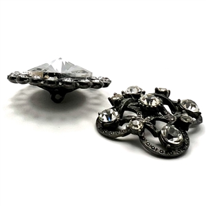 Talk about BLING! Two jeweled buttons.