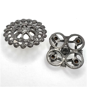 Talk about BLING! Two jeweled buttons.