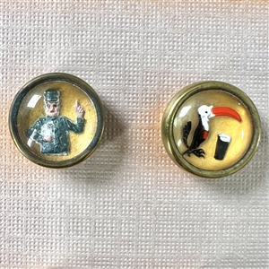 Original set of British Guinness buttons with store card.