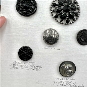 Card of 13 - Div. I black glass buttons.
