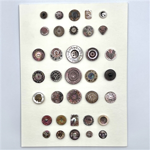 Card of 35 pearl and shell buttons including OMEs and DFs. 