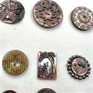 Card of 35 pearl and shell buttons including OME's and DF's. 