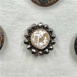 Card of 35 pearl and shell buttons including OME's and DF's. 