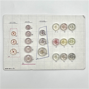 Six salesman sample cards of Vintage plastic buttons.