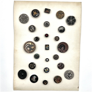 Card of 25 black glass buttons. 