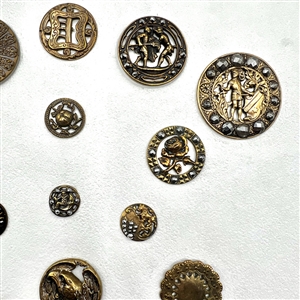 Card of 20 brass buttons of assorted subjects.
