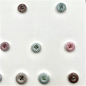 Card of 22 china calico & china buttons.