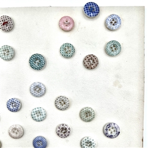 Card of 42 china calico buttons.