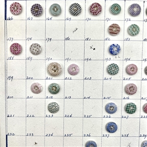 Card of 60 numbered china calico buttons.