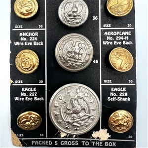 Salesman's sample card of 13 Eagle Anchor and Aeroplane buttons.