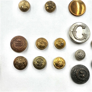 Card of 35 uniform buttons. 
