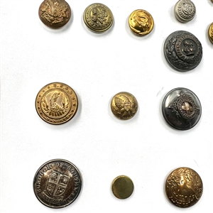 Card of 35 uniform buttons. 