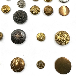 Card of 35 uniform buttons. 