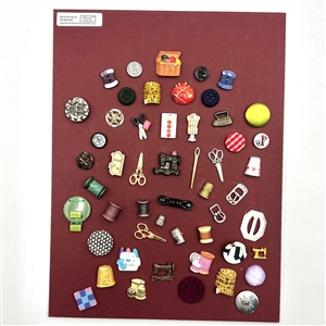 Card of 51 (mostly) sewing themed buttons .